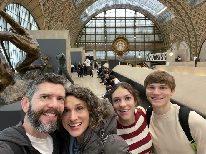 Owen, fifteen, with his family inside the Musée d'Orsay